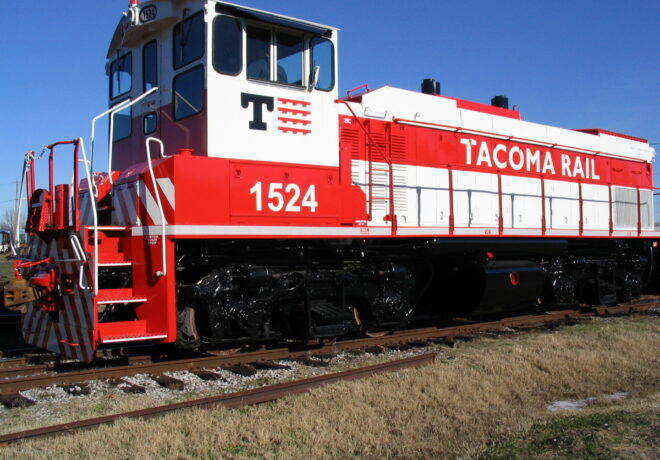 A red and white locomotive numbered 1524, labeled 