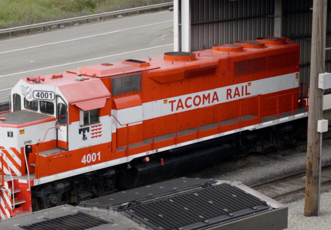 An red and white locomotive labeled 