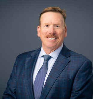 A headshot of Tim Flood